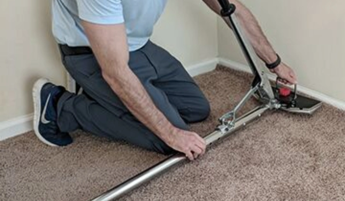 Technician Doing Carpet Restretching